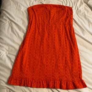 Strapless coral eyelet dress w/ ruffle hem